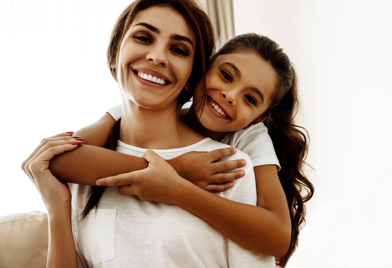 Parent and child smiling